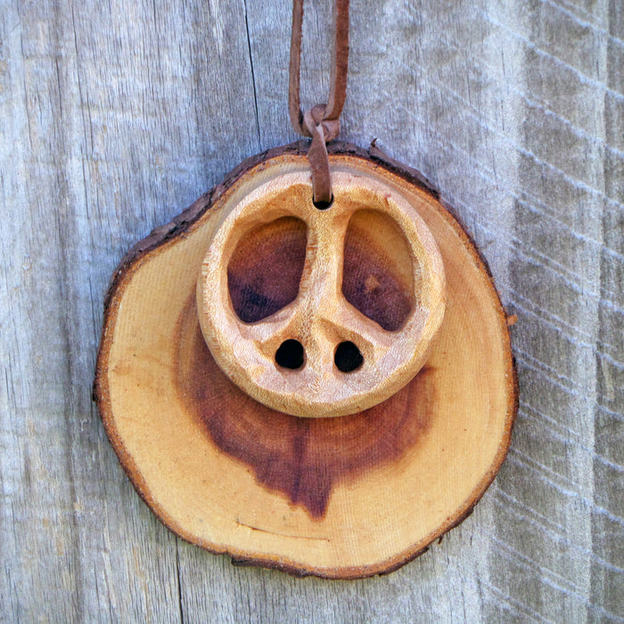 Hand-carved Recycled Barnwood Peace Sign on Walnut Tree Slice