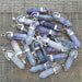 Flourite Crystal Point Pendants grouped in a pile