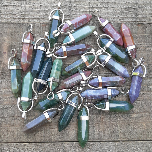 Indian Agate Crystal Point Pendants Grouped in a pile