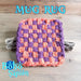 Mug Rug with Orange and Purple Loops