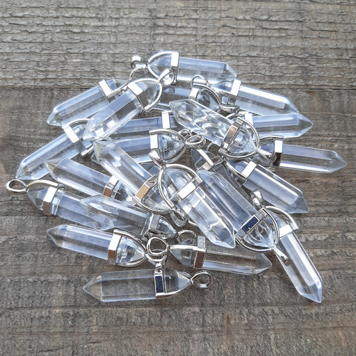 Quartz Crystal Point Pendants Grouped in a Pile