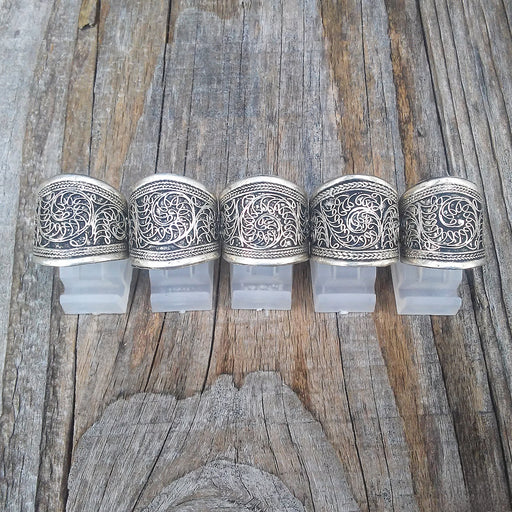 Tibetan Silver Filigree Ring Group with Paisley Shaped Scroll Wire Work