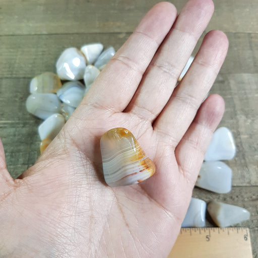 Banded Agate Tumbled Stone in Hand Front