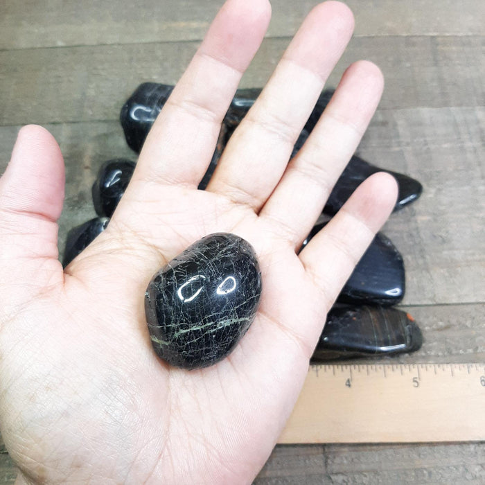 Tumbled Black Tourmaline Stone in Palm