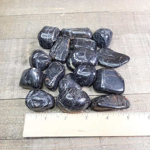 Tumbled Black Tourmaline Pile of Stones with Ruler